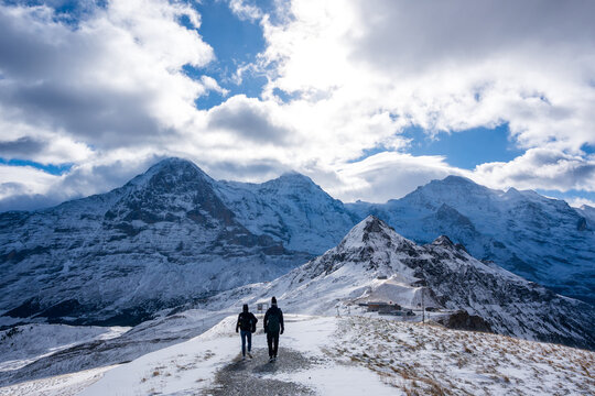 M&auml;nnlichen Royal Walk snowy trail with majestic alpine mountain peaks. Grindelwald, Canton of Bern, Switzerland.