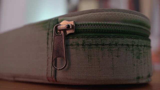 Close Up of Fabric Pencil Case With Metal Zipper Showing Textile Texture, Everyday School Supply and Minimal Workspace Detail