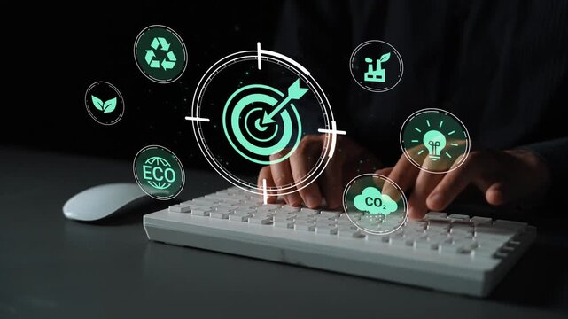 Hands typing on a keyboard with eco-friendly icons representing sustainability goals, recycling, and carbon reduction in a digital environment Gluon.