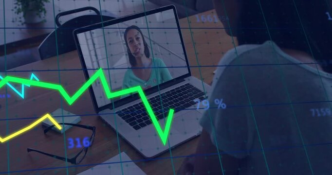 User joining finance call reviewing data while laptop showing speaker with charts overlaying table