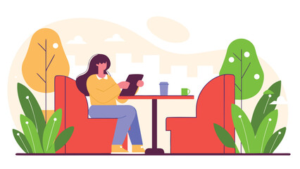 Fototapeta premium A woman in a yellow sweater sits on a red armchair in a cafe or lounge area using a tablet computer at a small table with mugs.