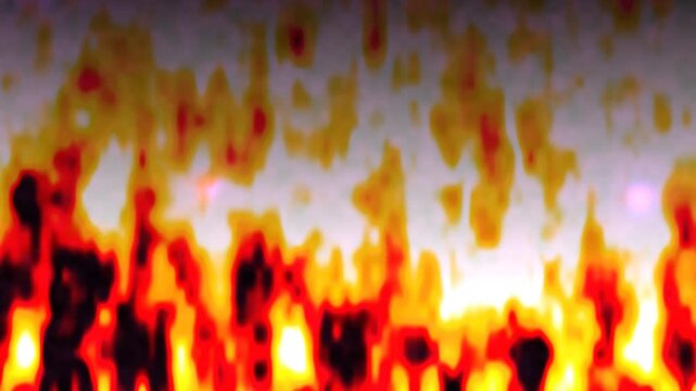 Intense abstract fire texture with blurred flames creating a fiery background pattern