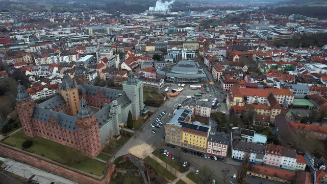 Aerial view around the old town of the city Aschaffenburg in Germany on a cloudy late winter day