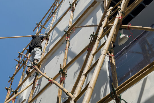 Working at heights, The workers are repairing the house, painted
