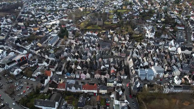 Aerial view around the old town of the city Herborn in Germany on a sunny late winter day