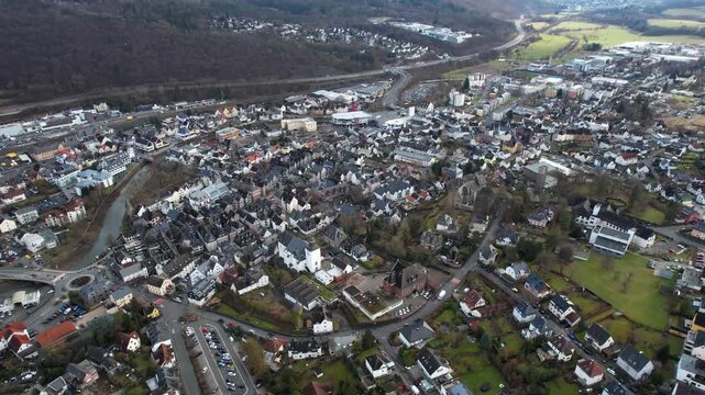 Aerial view around the old town of the city Herborn in Germany on a sunny late winter day