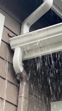 Water overflowing a gutter
