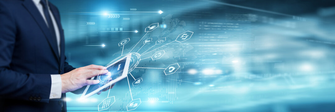 Businessman analysing DevOps data and global network infrastructure on tablet device, software deployment, cloud integration, IT operations management, continuous delivery.