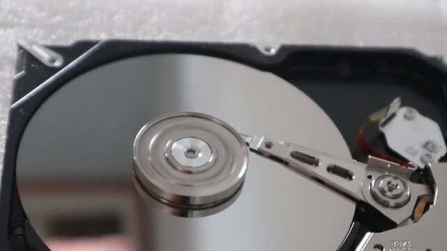 Hard disk drive reading data. Hard disk drive rotation while reading data