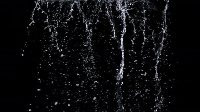 Super Slow Motion Shot of Falling Water Isolated on Black at 1000fps.