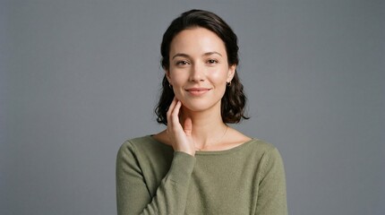 Fototapeta premium Portrait of a confident woman studio photography neutral background close-up self-empowerment concept