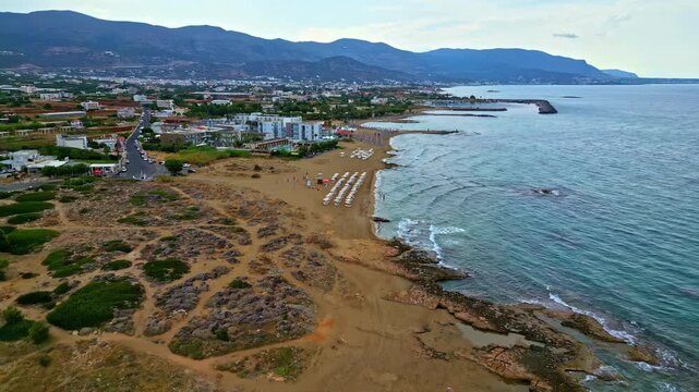 High panoramic view over Potamos beach and village.