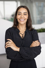 Happy beautiful young female business leader woman posing for professional vertical head shot,...