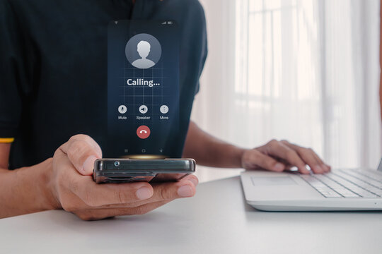 A man holding a mobile phone to call someone with a voice call. Outgoing call calling concept.