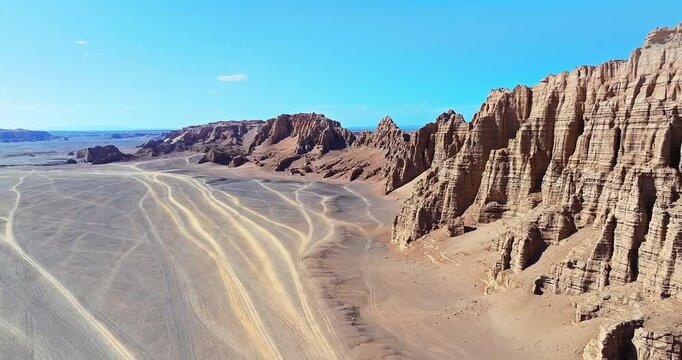 Aerial view of Yardang landforms and rock formations in the Gobi Desert, Xinjiang, China.