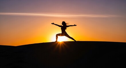 Silhouette of Woman Performing Yoga Warrior Pose at Sunset.
