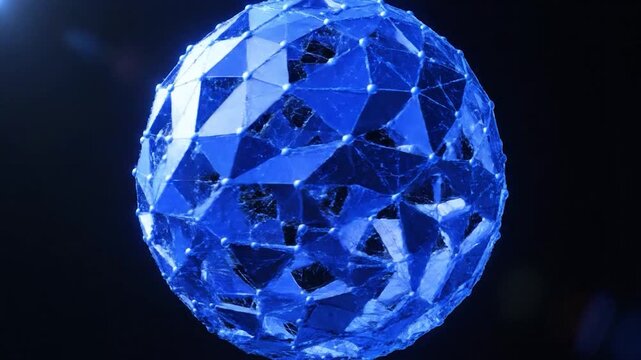 A glowing abstract blue geometric sphere with connected lines floats in a dark