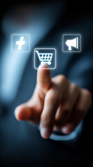 Hand touching glowing digital shopping cart icon