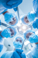 Patient POV medical team holding surgical instruments in operating room