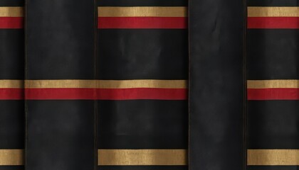 A close-up view of a black fabric with red and gold stripes