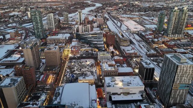 Aerial view of downtown Calgary cityscape by drone on a beautiful winter evening. 