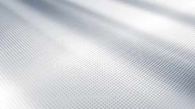 Abstract white and grey background with subtle halftone dot pattern and light