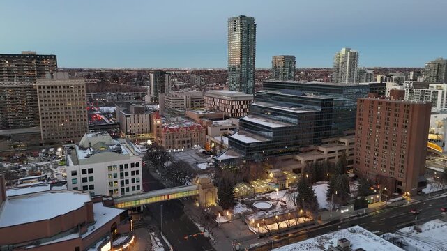 Aerial view of downtown Calgary cityscape by drone on a beautiful winter evening. 