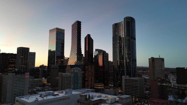 Aerial view of downtown Calgary cityscape by drone on a beautiful winter evening. 