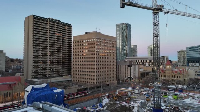 Aerial view of downtown Calgary cityscape by drone on a beautiful winter evening. 