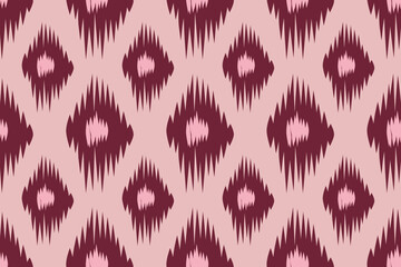 Obraz premium Ikat-style geometric pattern in dark red and soft pink tones featuring repeating diamond shapes in a seamless design. A simple, bold, and textile-inspired background.