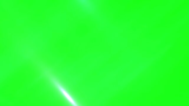 Bright light flares creating dynamic motion across a vivid green screen background, perfect for chroma key video footage.