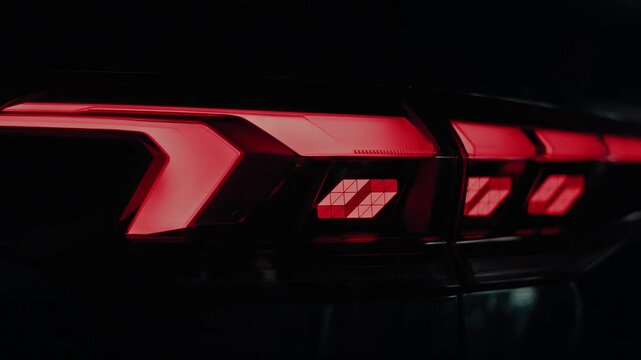 Modern Car Taillight Design Illuminated in Darkness