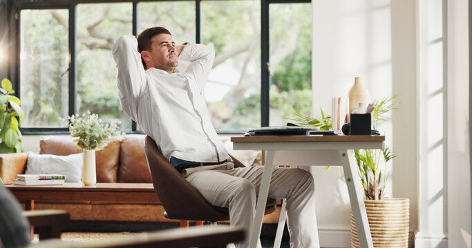 Happy, relax and man in home for remote work with satisfaction, stretching and done with tasks. Freelancer, business and person with calm, rest and break for project deadline, freedom and finish