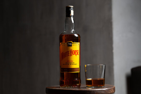 White Horse blended scotch whisky bottle editorial. 