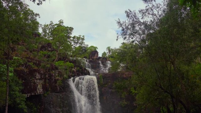 Cedar Creek Waterfall Australia Falls Conway Forest Reserve National Park Whitsunday island region blue sky cloudy Proserpine Airlie Queensland tropical jungle forest rainy season freshwater pan down