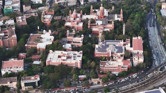 Long-distance aerial view of High Court of Judicature at madras background tamil nadu secretariat with port area and heavy traffic with crowded residentials buildings in chennai, tamil nadu