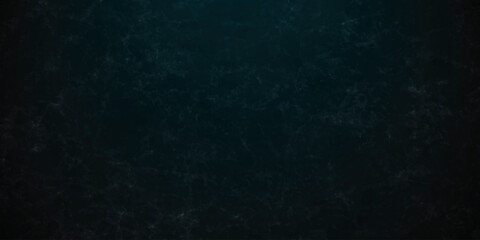 Dark charcoal grunge wall texture background. Dark black rough grunge surface with smoke edge. Black texture chalk board and black board. © MDFAIMIDULISLAM