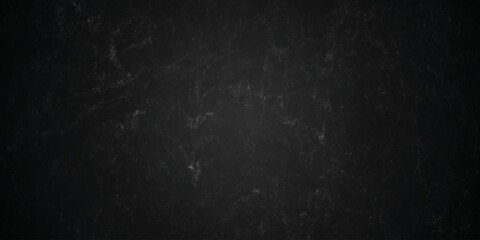 Dark charcoal grunge wall texture background. Dark black rough grunge surface with smoke edge. Black texture chalk board and black board. © MDFAIMIDULISLAM