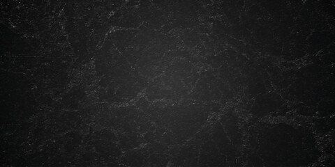 Dark charcoal grunge wall texture background. Dark black rough grunge surface with smoke edge. Black texture chalk board and black board. © MDFAIMIDULISLAM