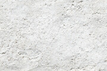 Obraz premium Close-up of a roughly textured, off-white surface with subtle tonal variations