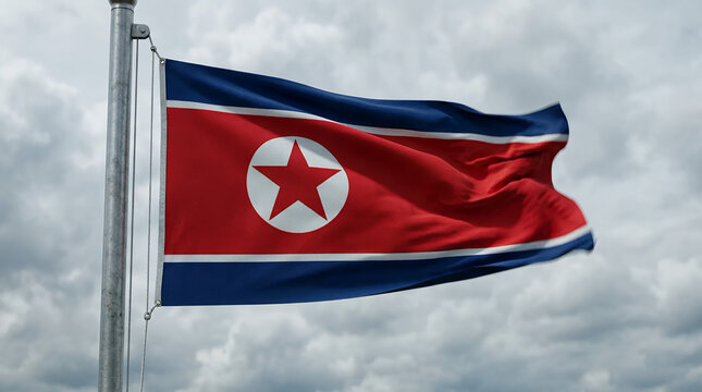 North Korean Flag Waving Proudly Against a Cloudy Sky.
