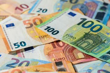 Obraz premium Euro banknotes on table closeup macro shot