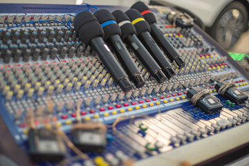 Professional Wireless Microphones on Mixing Console Set for Outdoor Event with copy space