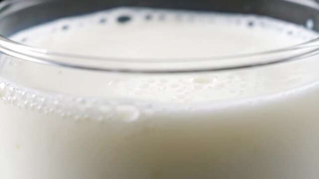Traditional kumis drink macro texture slow rotating camera professional video