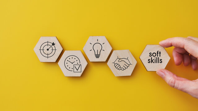 Soft Skills Icons Set with Hand Placing Hexagon Blocks on Yellow Background