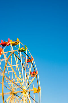 Amusement Park, Santa Cruz, a large ferris wheel,, low angle view, blue sky background.
