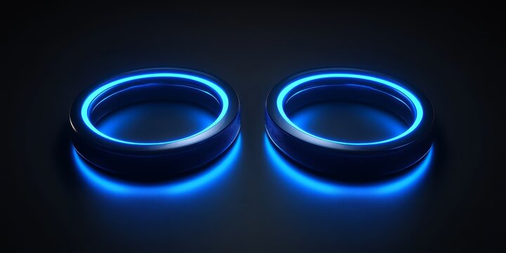 Glowing blue rings on dark background neon illuminated circular objects futuristic technology