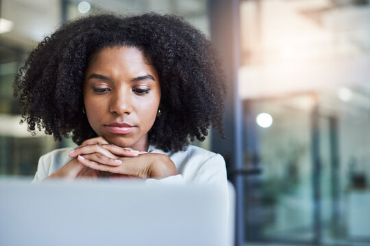 Laptop, reading and businesswoman in office, legal research and lawsuit revision for labor law case. Justice, pc or African lawyer with planning for dismissal dispute, litigation process or advocate