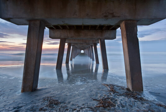 Tybee Island near Savannah, Tybee Pier at dawn, view of the underneath of the pier building.
