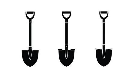 Three black garden shovels shown in a striking silhouette © mst